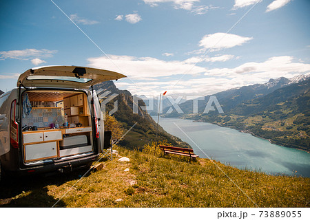 Vanlife - Camping Van on a mountain in Switzerland 73889055