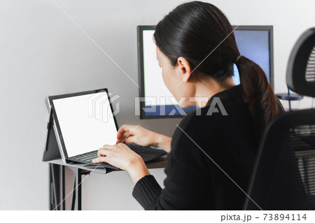 Businesswoman hands typing on laptop keyboard. Businesswoman hands typing on laptop keyboard. 73894114