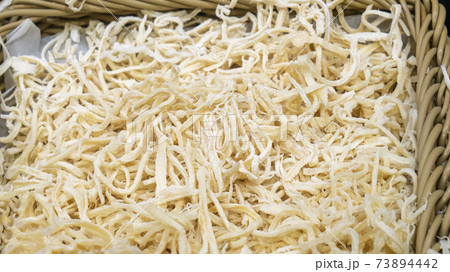 sliced dried squid close up sliced dried squid close up 73894442