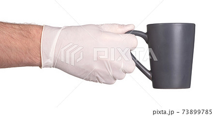 Latex glove isolated on white background Latex glove isolated on white background 73899785