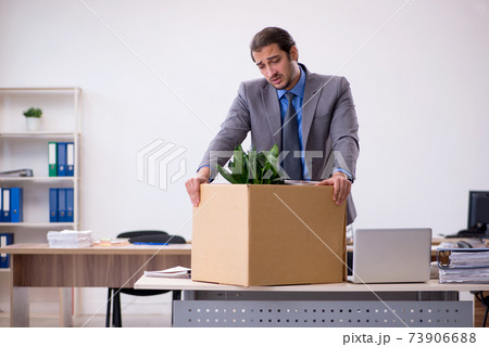 Young male employee being fired from his work Young male employee being fired from his work 73906688