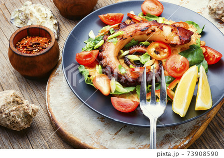 Octopus salad with vegetables Octopus salad with vegetables 73908590