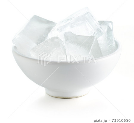 Bowl of ice cubes isolated on white background 73910650