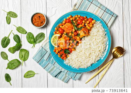 Chicken and chickpea curry with rice, top view Chicken and chickpea curry with rice, top view 73913641