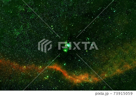 Galaxy in green tones, in deep space. Elements of this image were furnished by NASA. Galaxy in green tones, in deep space. Elements of this image were furnished by NASA. 73915059