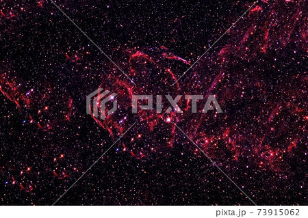 Red galaxy in deep space. Elements of this image were furnished by NASA. 73915062