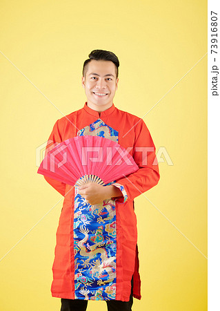 Asian man celebrating Tet Asian man celebrating Tet 73916807