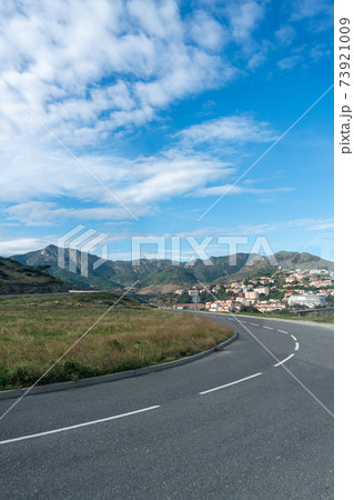 Winding asphalt road on the south coast of Spain 73921009