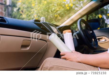 Hand women holding plastic reusable drink a cup,Environmental friendly,Healthy green,Zero waste,Conscious lifestyle concept Hand women holding plastic reusable drink a cup,Environmental friendly,Healthy green,Zero waste,Conscious lifestyle concept 73925150