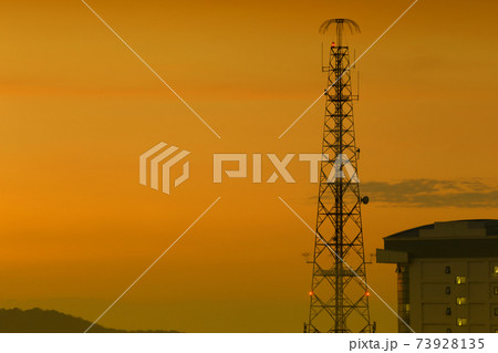 Signal towers on the background of the twilight sky. Signal towers on the background of the twilight sky. 73928135