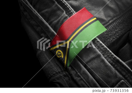 Tag on dark clothing in the form of the flag of the Vanuatu 73931356