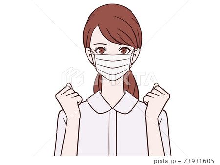 ガッツポーズをするマスクをつけた看護師 73931605