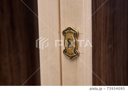 Joinery. Wooden cabinet doors with keyhole. Wooden frame. Wooden furniture manufacturing process Joinery. Wooden cabinet doors with keyhole. Wooden frame. Wooden furniture manufacturing process 73934093