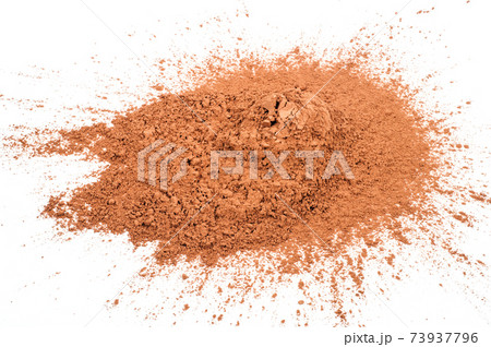 Pile cocoa powder on white background Pile cocoa powder on white background 73937796