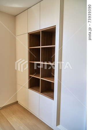 Modern bookcase. Design of wooden bookcase for modern office Modern bookcase. Design of wooden bookcase for modern office 73939390