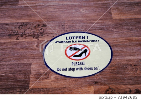 No shoes sign at entrance on the floor of St. Sophia, Sofia Cathedral, Selimiye Mosque. North Nicosia, Lefkosa, Northern Cyprus.  73942685