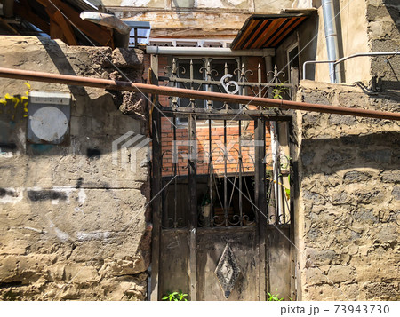 Outdoor, Streets, Old houses and Iron Gates with Ornaments Of Old Town Tbilisi, Georgia 73943730