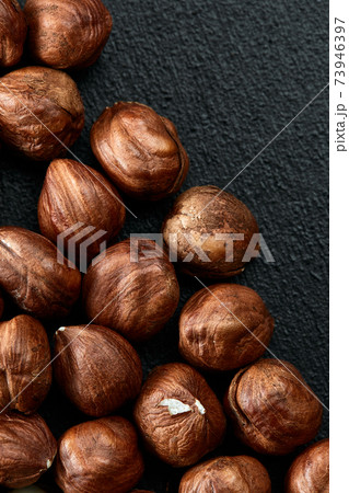 Close up of Hazelnut kernels - Food Frame Background, macro detailed close up. Close up of Hazelnut kernels - Food Frame Background, macro detailed close up. 73946397