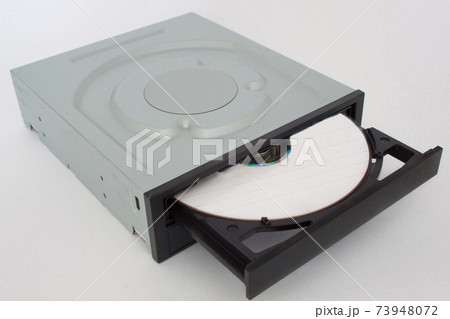 Opened CD - DVD drive with black cap, disk inside. 73948072