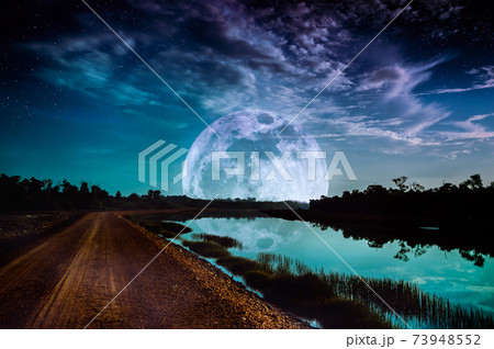 Landscape of sky with supermoon, many stars. Serenity background. Landscape of sky with supermoon, many stars. Serenity background. 73948552