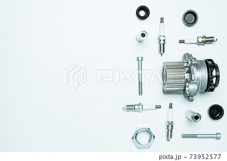 Car service tools. Set of new metal car part. Auto motor mechanic spare or automotive piece isolated on white background. Technology of mechanical gear with space for text. Car service tools. Set of new metal car part. Auto motor mechanic spare or automotive piece isolated on white background. Technology of mechanical gear with space for text. 73952577