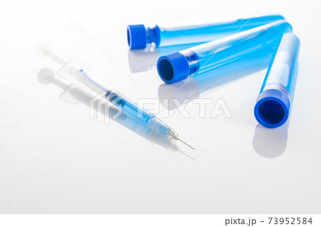 Syringe injection. Medical syringe with needle for protection flu virus and coronavirus. Covid vaccine isolated on white. Nurse or doctor. Liquid drug or narcotic. Syringe injection. Medical syringe with needle for protection flu virus and coronavirus. Covid vaccine isolated on white. Nurse or doctor. Liquid drug or narcotic. 73952584