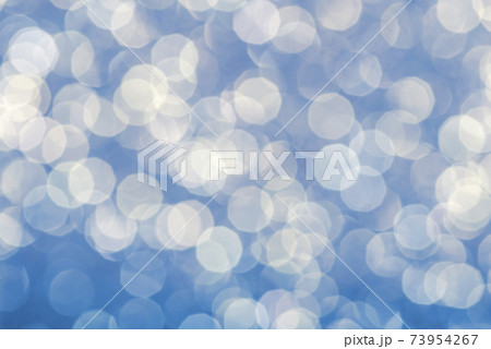 Blue christmas festive elegant abstract background with bokeh Blue christmas festive elegant abstract background with bokeh 73954267