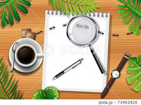 Top view of wooden table with office objects and leaves element 73963826