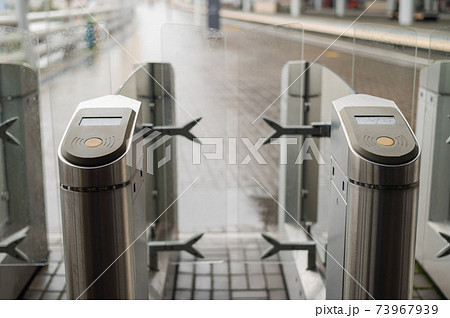 Empty turnstiles at a railway station. Empty turnstiles at a railway station. 73967939