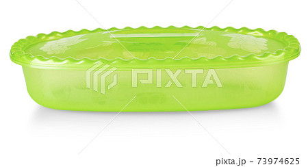 green plastic bowl with lid isolated on white 73974625