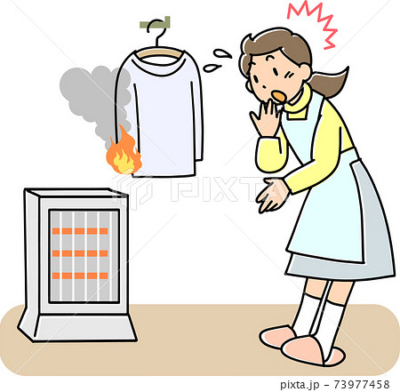 ストーブからの出火に驚く女性 ストーブからの出火に驚く女性 73977458