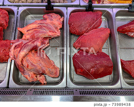 Assorted fresh beef meat for sale at butcher shop Assorted fresh beef meat for sale at butcher shop 73989438
