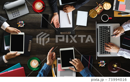 Top view Business and lawyers discussing contract papers with brass scale on desk in office. Law, legal services, advice, justice and law concept .. 73994016