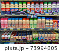 Blur image of shelf with consumer product shop in supermarket 73994605