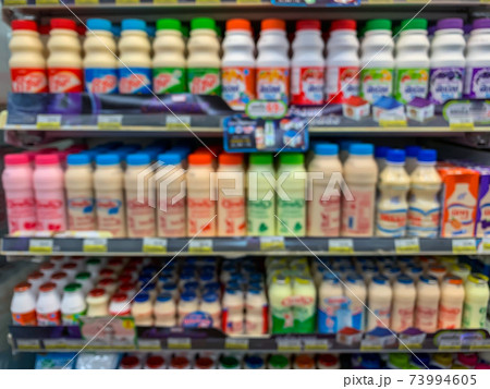 Blur image of shelf with consumer product shop in supermarket Blur image of shelf with consumer product shop in supermarket 73994605