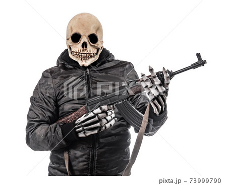 The man in mask of skeleton armed with kalashnikov isolated on a white background. The man in mask of skeleton armed with kalashnikov isolated on a white background. 73999790