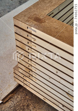 Joinery. Wood door manufacturing process. Stacked door leafs. Furniture manufacture 74002755