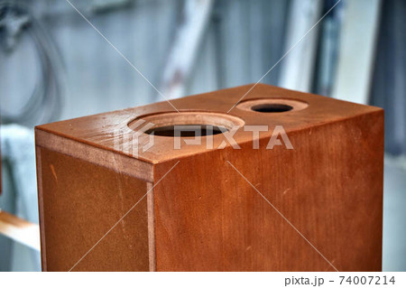 Painting audio speakers. Painting chamber, spray gun. Furniture manufacture. Close-up 74007214