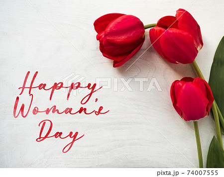 Bright flowers and Happy Women's Day lettering Bright flowers and Happy Women's Day lettering 74007555