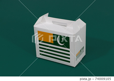 Azad Kashmir flag on white box with barcode and the color of nation flag on green background. 74009105