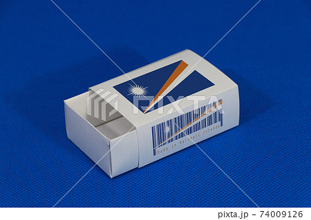 Marshall flag on white box with barcode and the color of nation flag on blue background 74009126