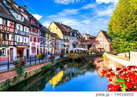 Most beautiful traditional villages of France - Colmar in Alsace with traditional colorful houses 74016050