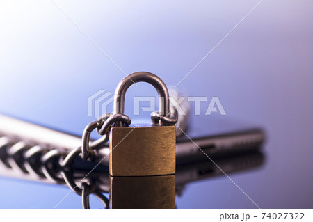 Modern smartphone with a lock. Data protection. Mobile phone security concept Modern smartphone with a lock. Data protection. Mobile phone security concept 74027322