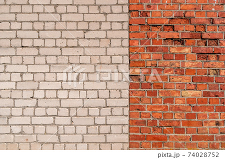 Brick wall full frame with two sections of different colours 74028752