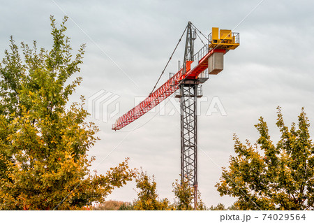 Construction tower crane against the sky Construction tower crane against the sky 74029564