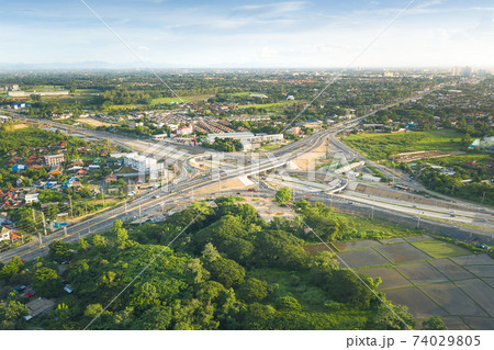 Aerial view of highway road and intersection road in Chiang Mai of Thailand. Aerial view of highway road and intersection road in Chiang Mai of Thailand. 74029805