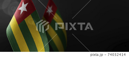 Small national flags of the Togo on a dark background Small national flags of the Togo on a dark background 74032414