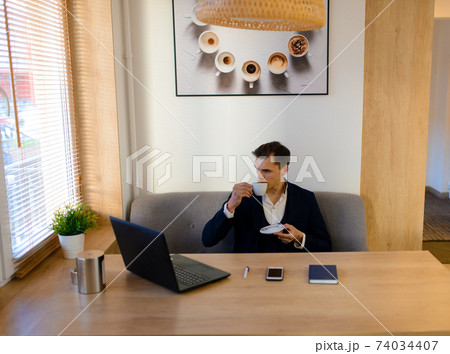 Young man on the street and in cafe with mobile phone, computer. Young man on the street and in cafe with mobile phone, computer. 74034407