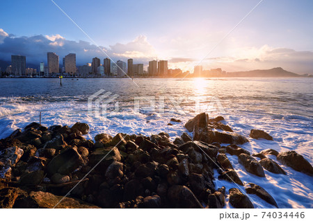 sunrise over Honolulu skyline, Oahu, Hawaii 74034446