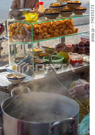 Vietnamese local style soup street food vendor 74035273